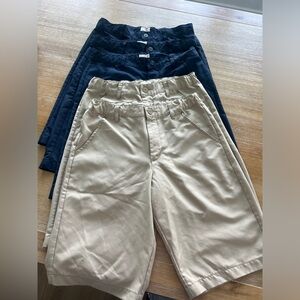 uniform short bundle. 3 navy / 2 khaki. Khaki  have minor spot near belt loop.
